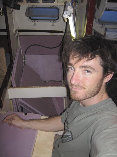 Putting in the 2 inches of insulation around where we\'re building the icebox