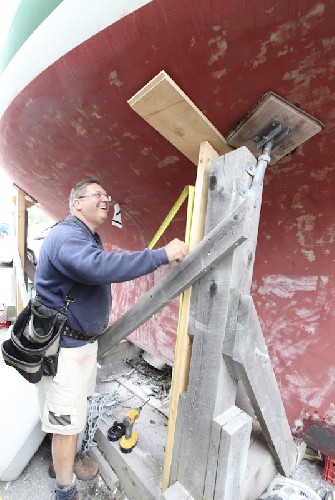 Terry the master woodworker making temporary supports so we can inspect the hull under the od supports