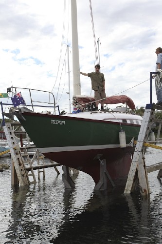 Chris standing on deck as Teleport is lowered into the water at last!
