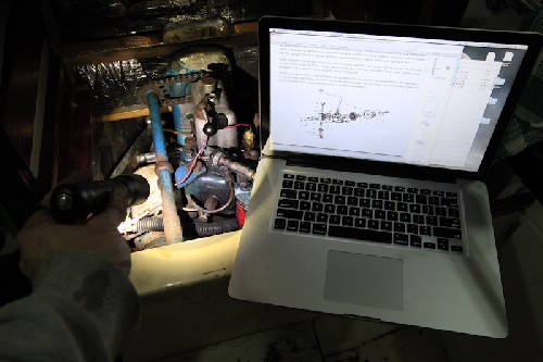 High tech with old - reading the engine manual on my macbook as I take it apart