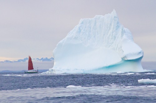 Jess sails Teleport past a berg while I bob around in the blow-up dingy to take this pic