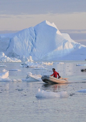 Chris zipping around the ice in our awesome dingy