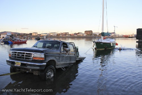 Phil reverses his truck ever deeper down the ramp