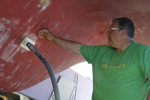 Terry pumping air into our wet keel with vacuum cleaner