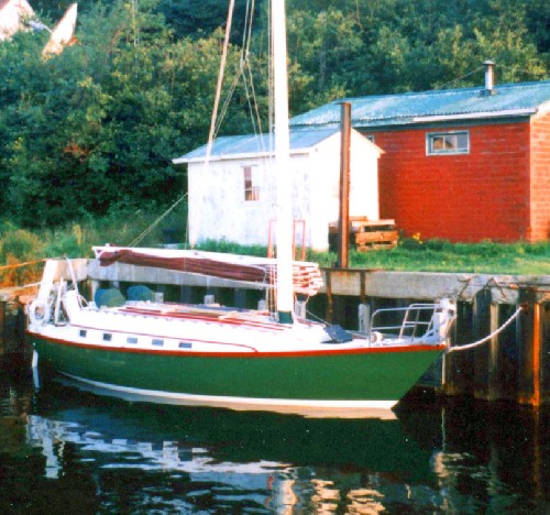 Marco Polo III (Teleport) tied up alongside a wharf
